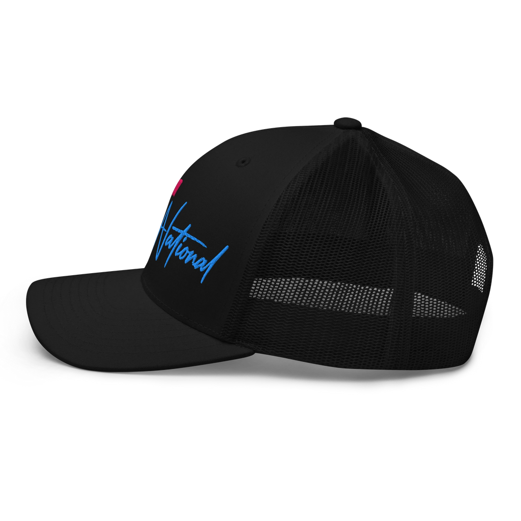 Birdie National black trucker hat with breathable mesh back and blue embroidered script logo, side profile view.