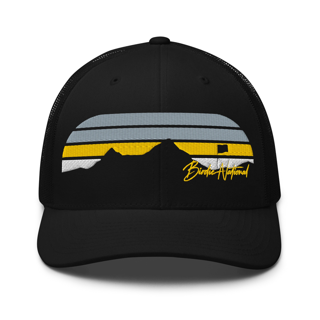 Birdie National black trucker cap featuring a mountain landscape graphic with yellow and grey stripes and a golf flag.