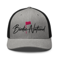 Birdie National grey and black trucker hat with embroidered logo and pink golf flag on a structured front panel.