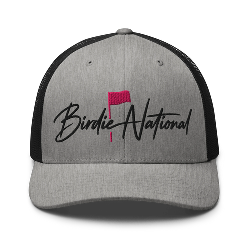 Birdie National grey and black trucker hat with embroidered logo and pink golf flag on a structured front panel.