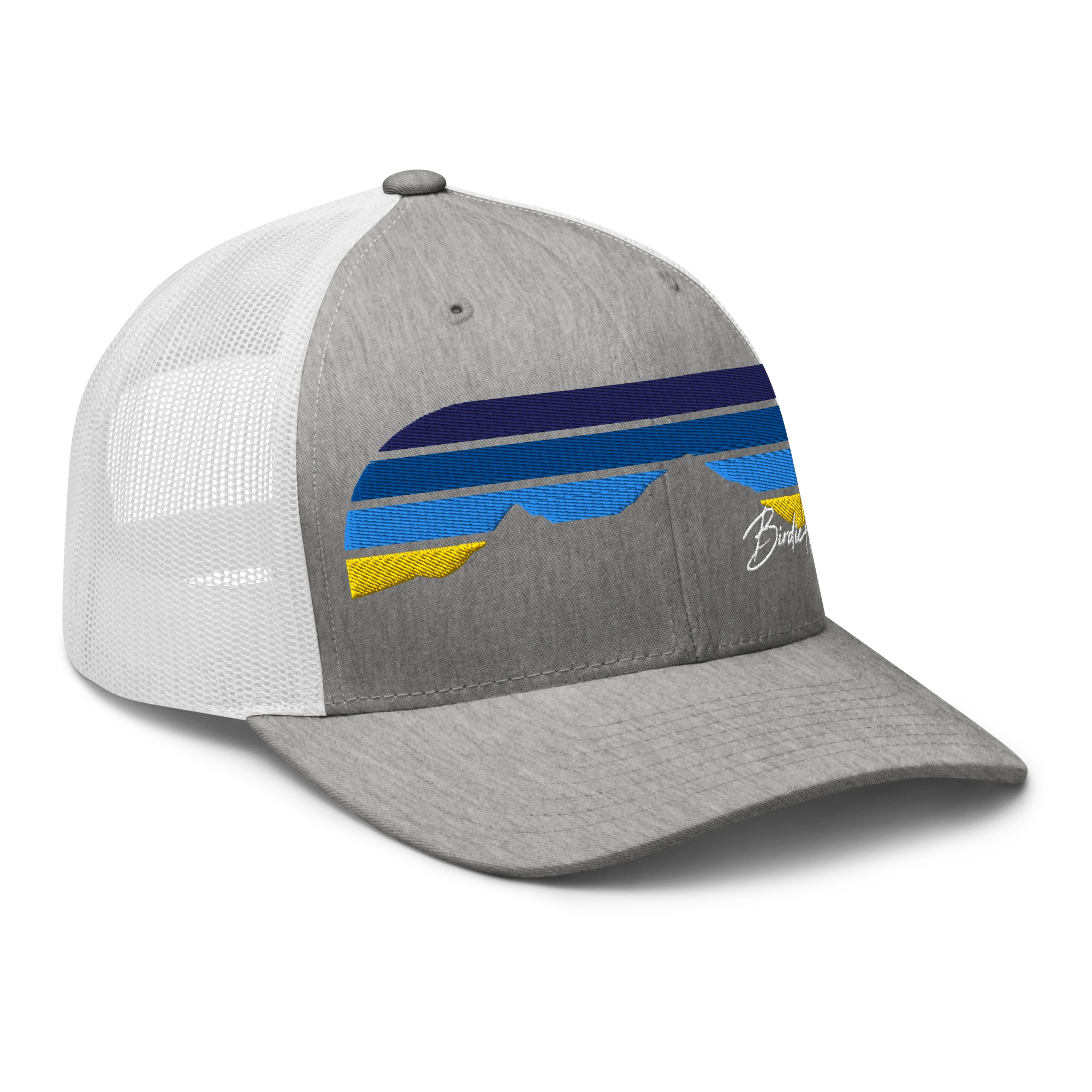 Birdie National grey and white trucker cap with mesh back and mountain-inspired blue and yellow graphic embroidery.
