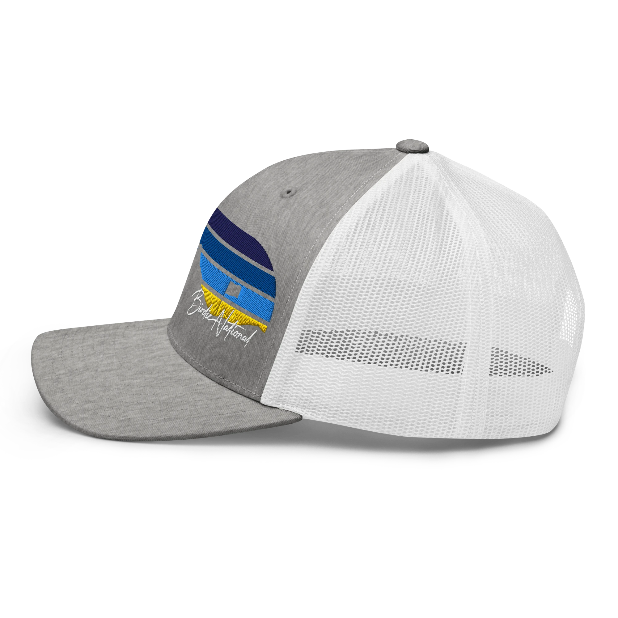 Birdie National grey and white trucker cap with mesh back and mountain graphic embroidery on the side profile.