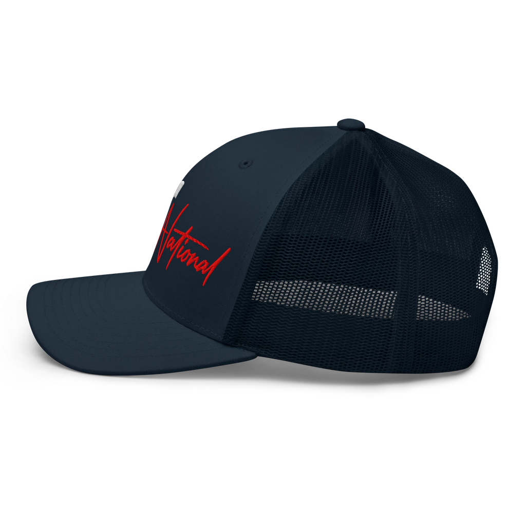 Birdie National navy trucker hat with mesh back and red embroidered logo, side profile view.