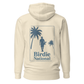 Birdie National sand-colored unisex hoodie featuring a blue coastal golf graphic on the back with palm trees.