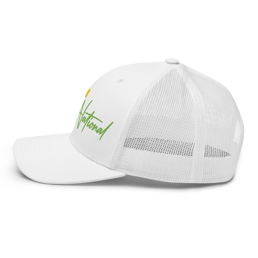 Birdie National white trucker hat with breathable mesh back and green embroidered logo, side profile view.